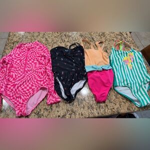 4 swim suits size M (7-8)
Cat and Jack
Wonder Nation 
Old Navy
